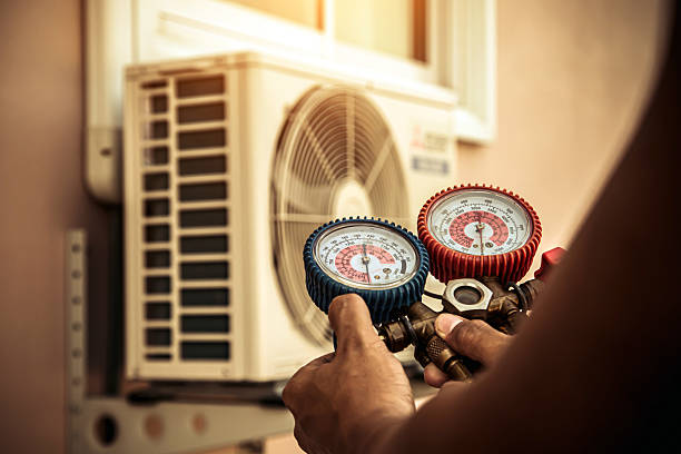 Professional Heat Pump Repair technician working in Indian Wells, CA